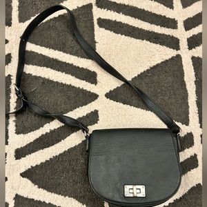 black saddle purse